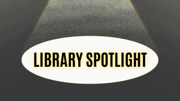 Library Spotlight dark background with a light shining on library spotlight