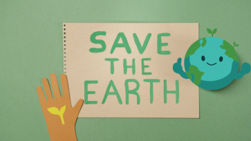 Save the Earth in green letters on a tan background with an extra large green border, and a cartoon of the globe and a hand with a seed in the palm.